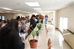 FFA students from Missouri and Arkansas are identifying plants at the floriculture workshop. 